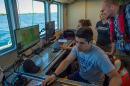 主要研究 GEBCO的澳门葡京网赌游戏们正在R/V Gulf Surveyor研究船上收集水深测量数据和后向散射数据